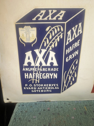 Emaljskylt AXA 